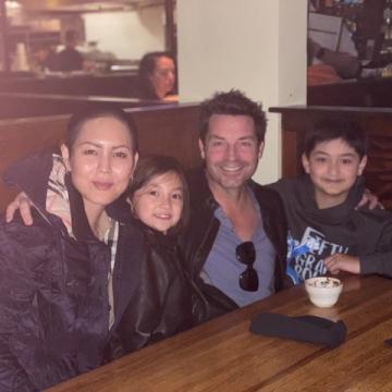 Stage 4 stomach cancer Camilla Row and her family having a good time in a restaurant